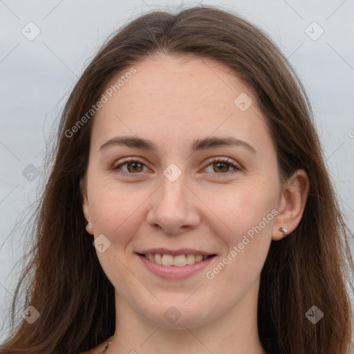 Joyful white young-adult female with long  brown hair and grey eyes