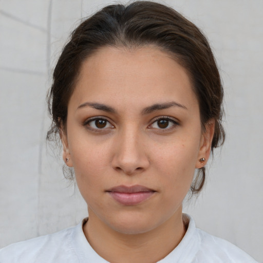 Neutral white young-adult female with medium  brown hair and brown eyes