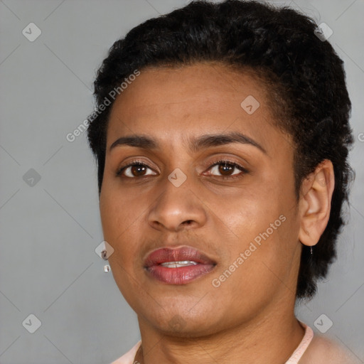 Joyful latino young-adult female with short  brown hair and brown eyes