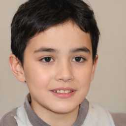 Joyful white child male with short  brown hair and brown eyes