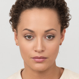 Neutral white young-adult female with short  brown hair and brown eyes