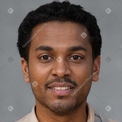 Joyful latino young-adult male with short  brown hair and brown eyes