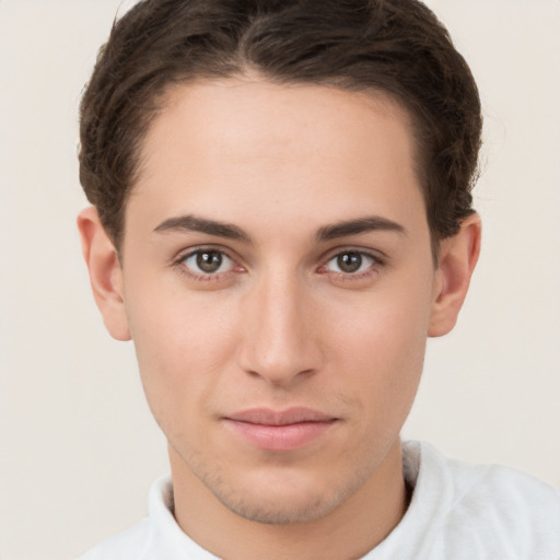 Neutral white young-adult male with short  brown hair and brown eyes