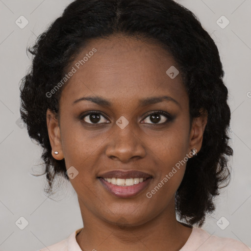 Joyful black young-adult female with medium  black hair and brown eyes