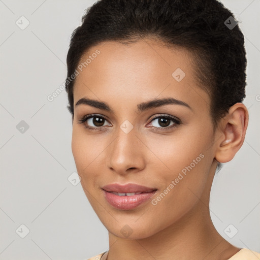 Joyful latino young-adult female with short  brown hair and brown eyes