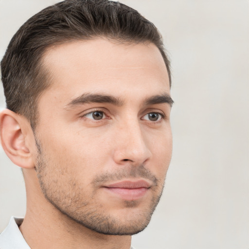 Neutral white young-adult male with short  brown hair and brown eyes