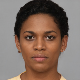 Neutral black young-adult female with short  brown hair and brown eyes