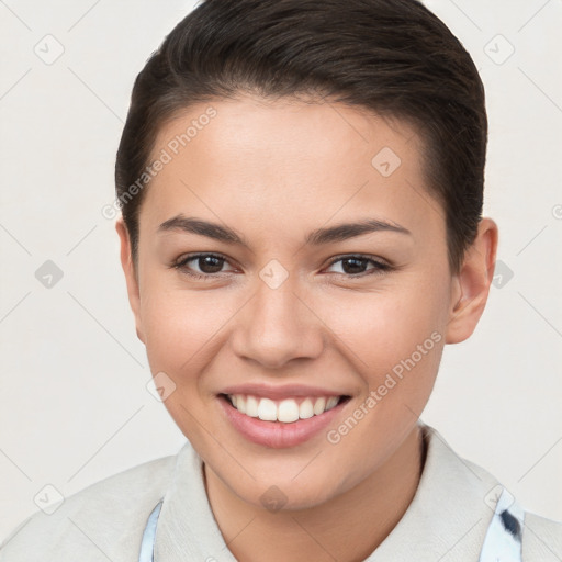 Joyful white young-adult female with short  brown hair and brown eyes