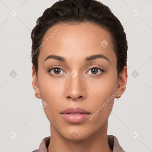 Neutral white young-adult female with short  brown hair and brown eyes