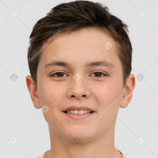 Joyful white child male with short  brown hair and brown eyes