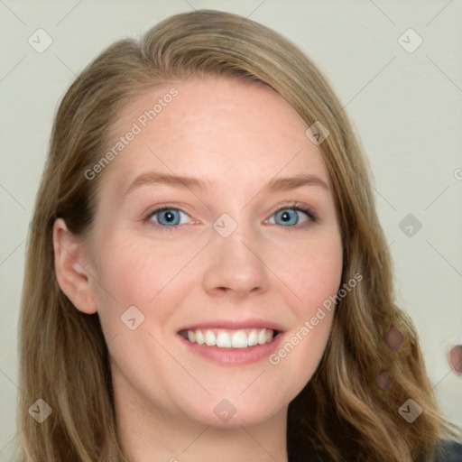 Joyful white young-adult female with long  brown hair and blue eyes