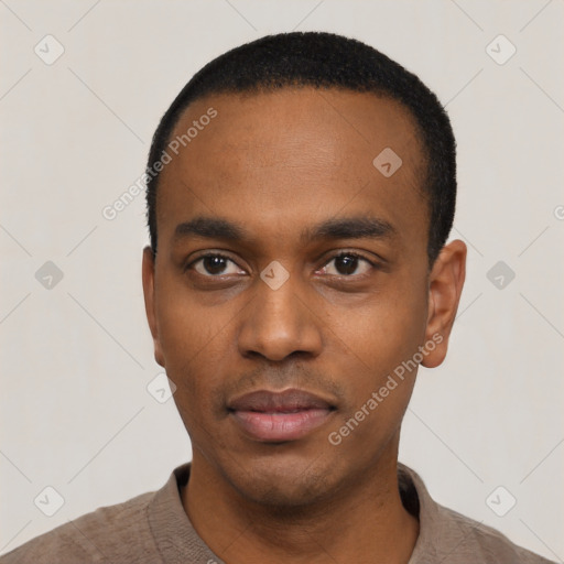 Neutral black young-adult male with short  black hair and brown eyes