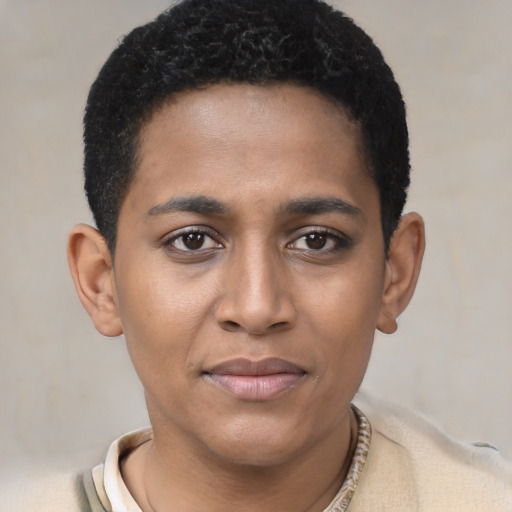 Joyful black young-adult female with short  black hair and brown eyes