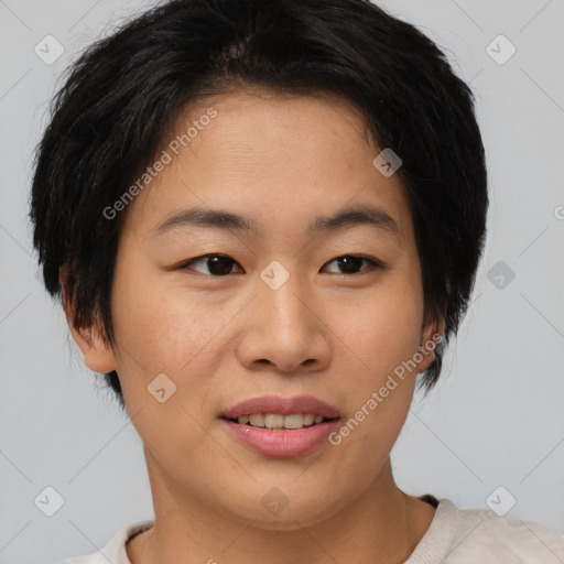 Joyful asian young-adult female with short  brown hair and brown eyes