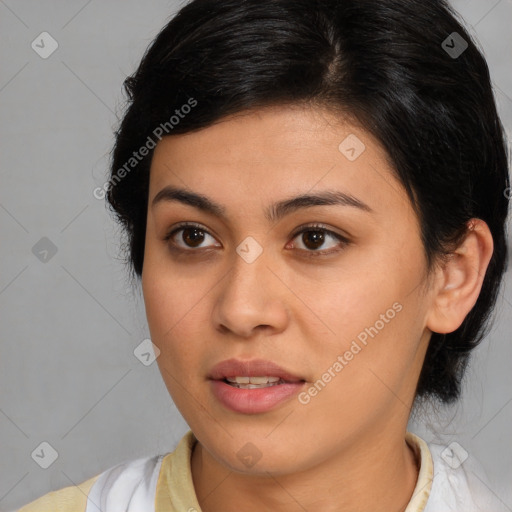 Joyful latino young-adult female with medium  brown hair and brown eyes