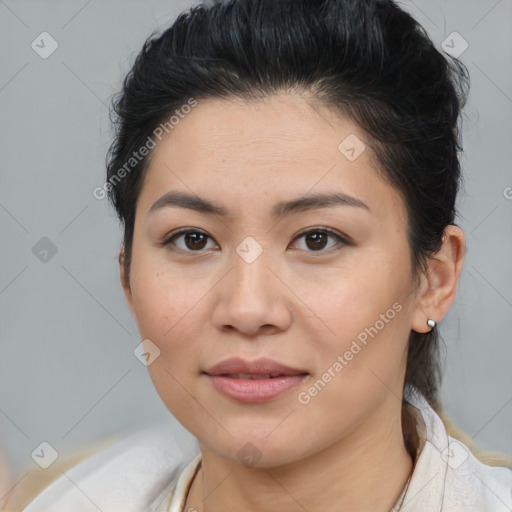 Joyful asian young-adult female with medium  brown hair and brown eyes