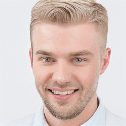 Joyful white young-adult male with short  brown hair and blue eyes