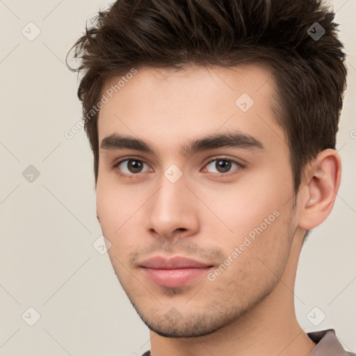 Neutral white young-adult male with short  brown hair and brown eyes