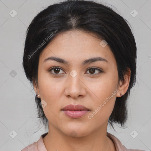 Joyful asian young-adult female with medium  brown hair and brown eyes