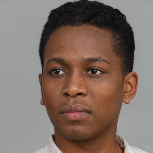 Neutral black young-adult male with short  brown hair and brown eyes