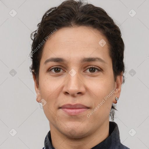 Joyful white adult female with short  brown hair and brown eyes