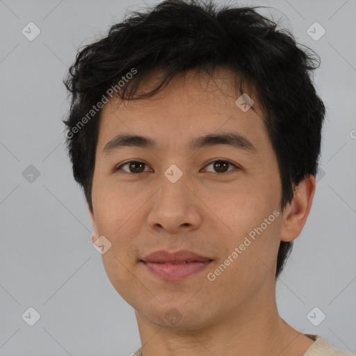 Joyful asian young-adult male with short  brown hair and brown eyes