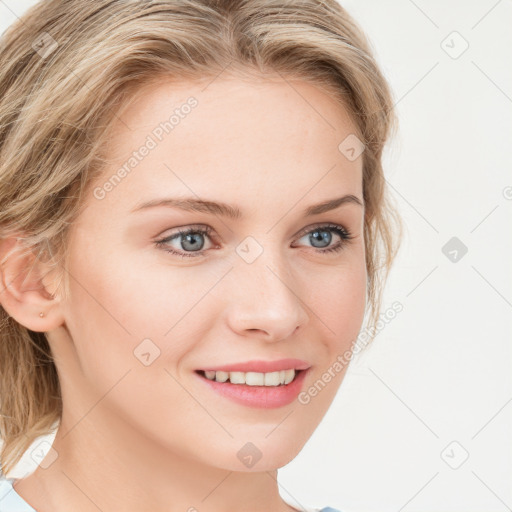 Joyful white young-adult female with long  brown hair and blue eyes