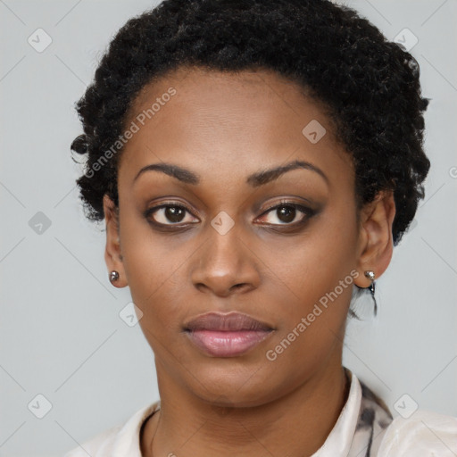 Neutral black young-adult female with short  brown hair and brown eyes