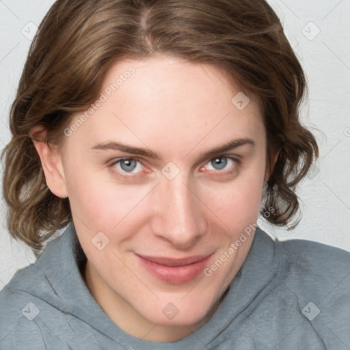 Joyful white young-adult female with medium  brown hair and blue eyes