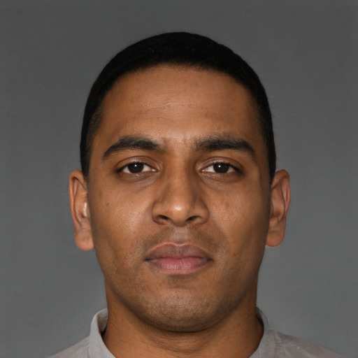 Neutral black young-adult male with short  brown hair and brown eyes