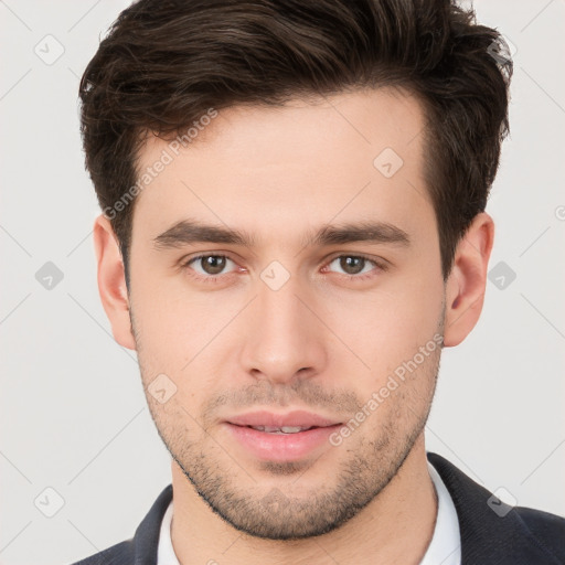 Neutral white young-adult male with short  brown hair and brown eyes