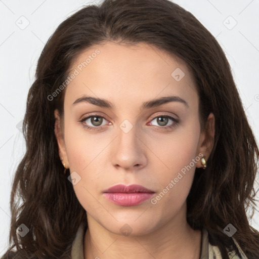 Neutral white young-adult female with long  brown hair and brown eyes