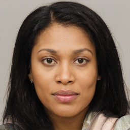 Joyful asian young-adult female with long  brown hair and brown eyes