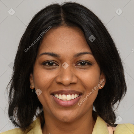 Joyful black young-adult female with medium  brown hair and brown eyes