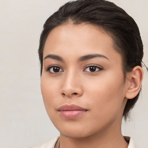 Neutral white young-adult female with medium  brown hair and brown eyes