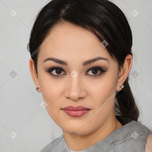 Joyful asian young-adult female with medium  black hair and brown eyes