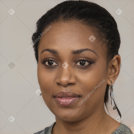 Joyful black young-adult female with medium  black hair and brown eyes