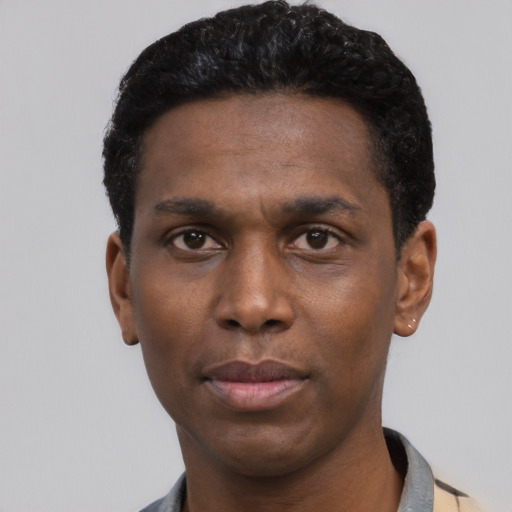Neutral black young-adult male with short  black hair and brown eyes