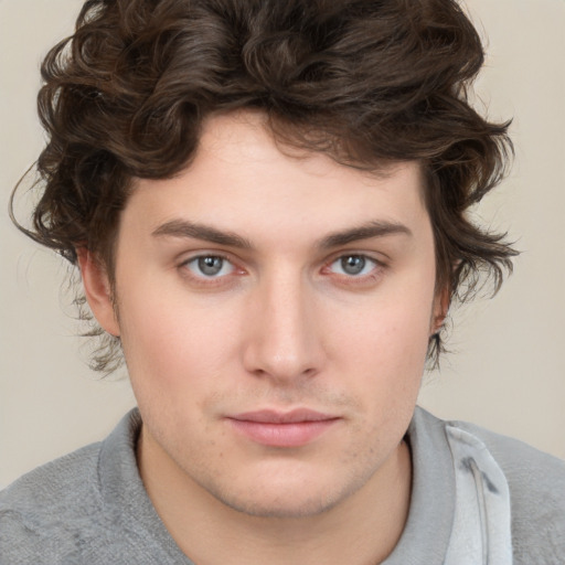 Neutral white young-adult male with medium  brown hair and brown eyes