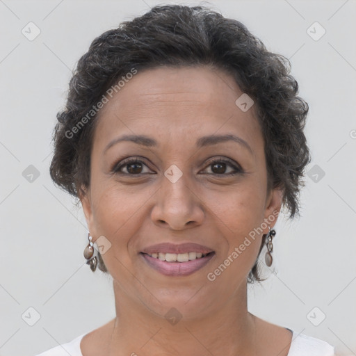 Joyful white adult female with short  brown hair and brown eyes