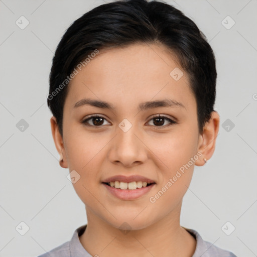 Joyful latino young-adult female with short  black hair and brown eyes