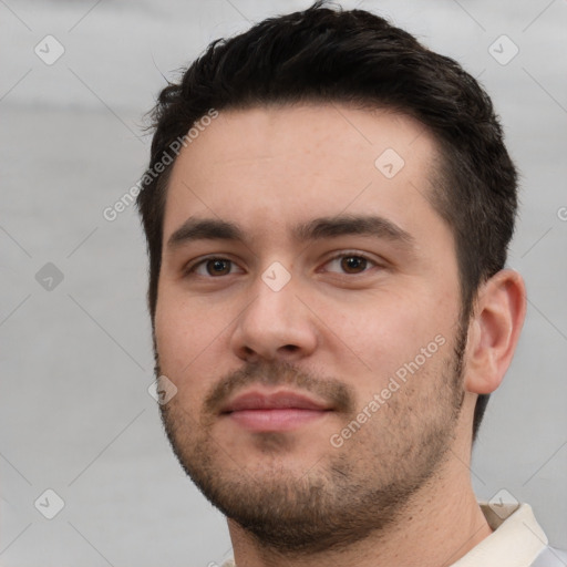 Neutral white young-adult male with short  black hair and brown eyes