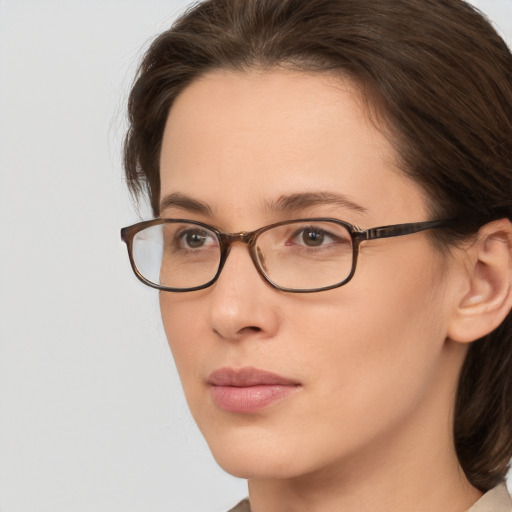 Neutral white young-adult female with medium  brown hair and brown eyes