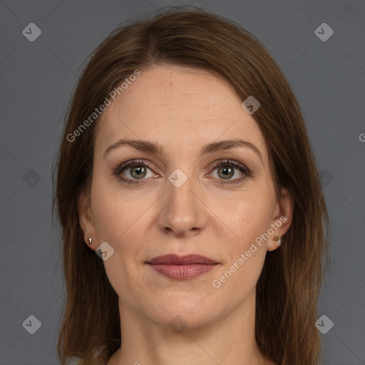 Joyful white adult female with medium  brown hair and grey eyes