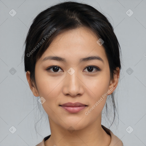 Joyful latino young-adult female with medium  black hair and brown eyes