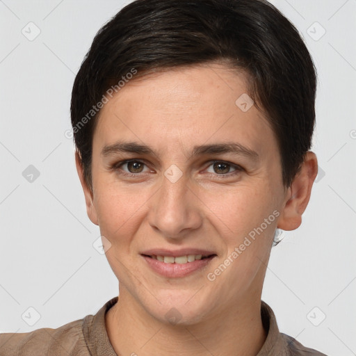 Joyful white young-adult female with short  brown hair and brown eyes