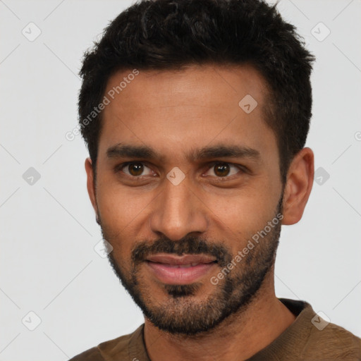 Joyful white young-adult male with short  black hair and brown eyes