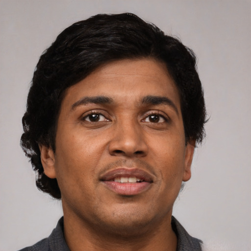 Neutral latino adult male with short  black hair and brown eyes