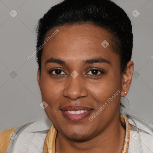 Joyful black young-adult female with short  brown hair and brown eyes