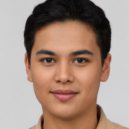 Joyful asian young-adult male with short  black hair and brown eyes